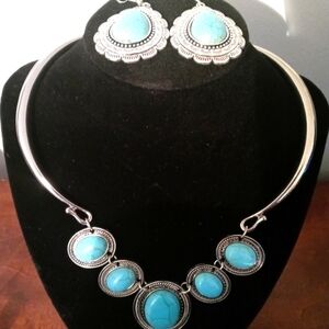 Brand new beautiful turquoise and silver plus earrings to match set